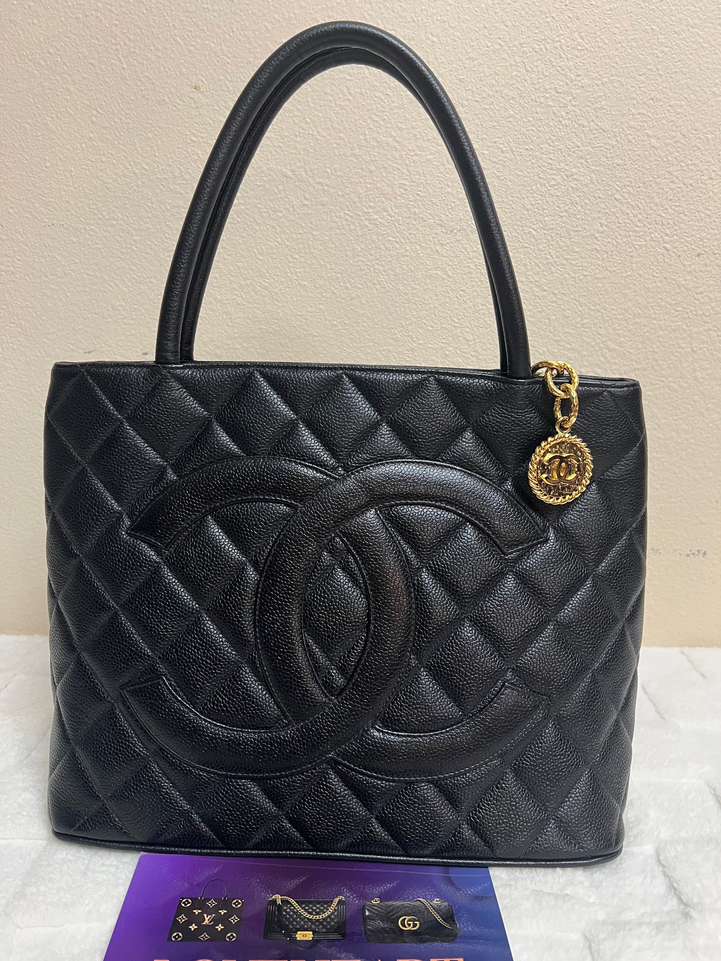 MEDALLION BLACK GHW