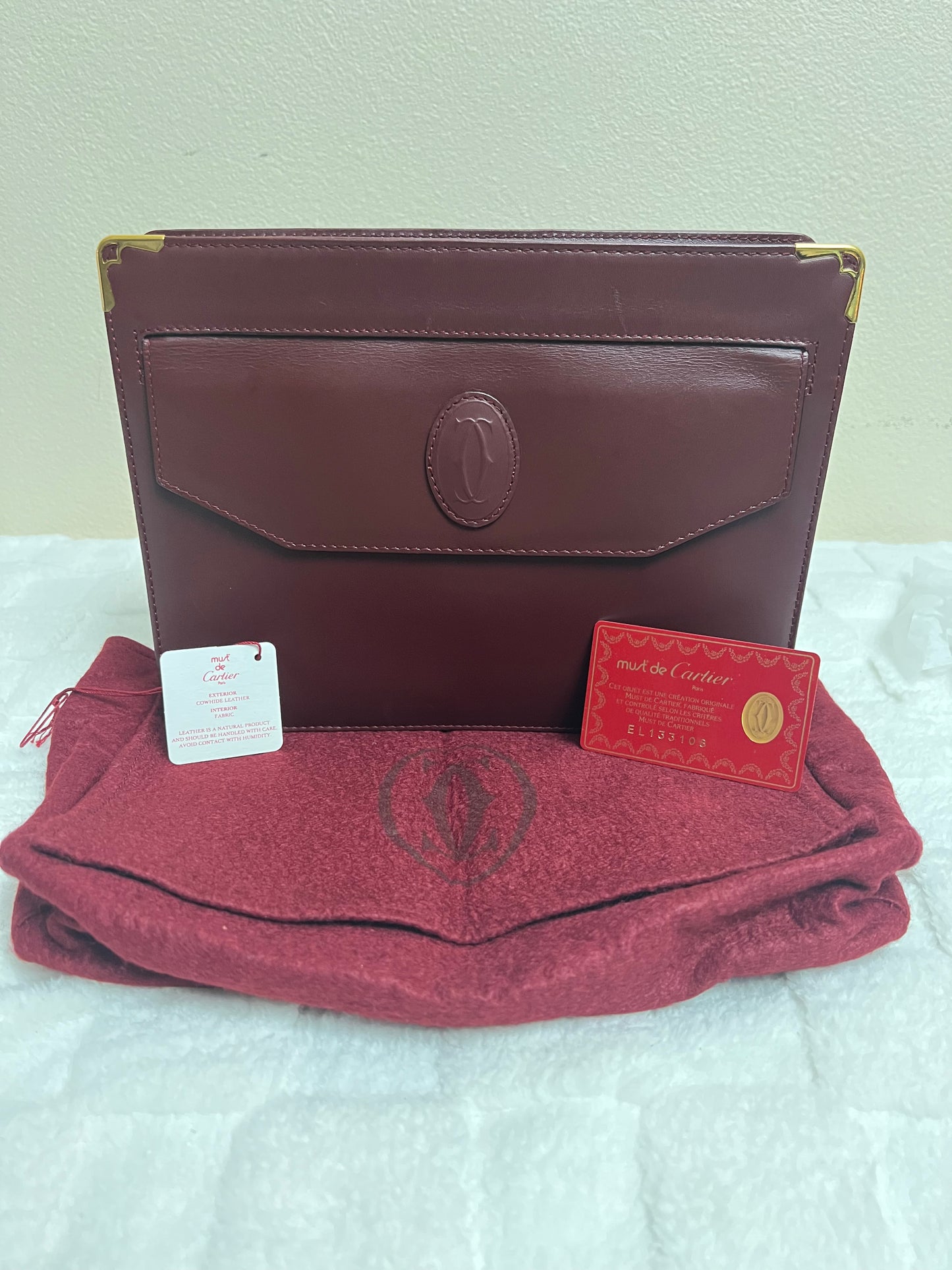 C_ A _ R _ T _ I _ E _ R CLUTCH MAROON