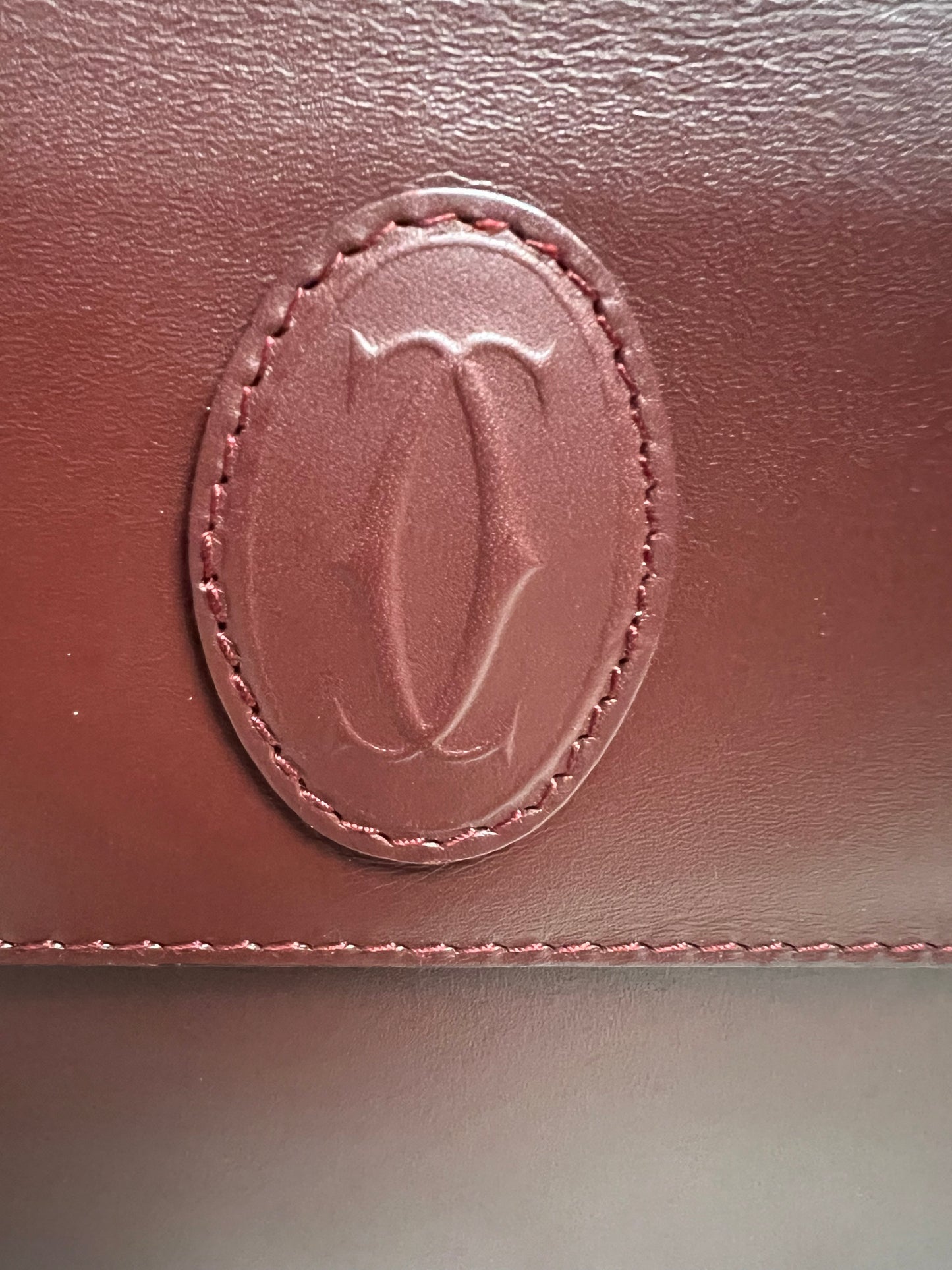 C_ A _ R _ T _ I _ E _ R CLUTCH MAROON