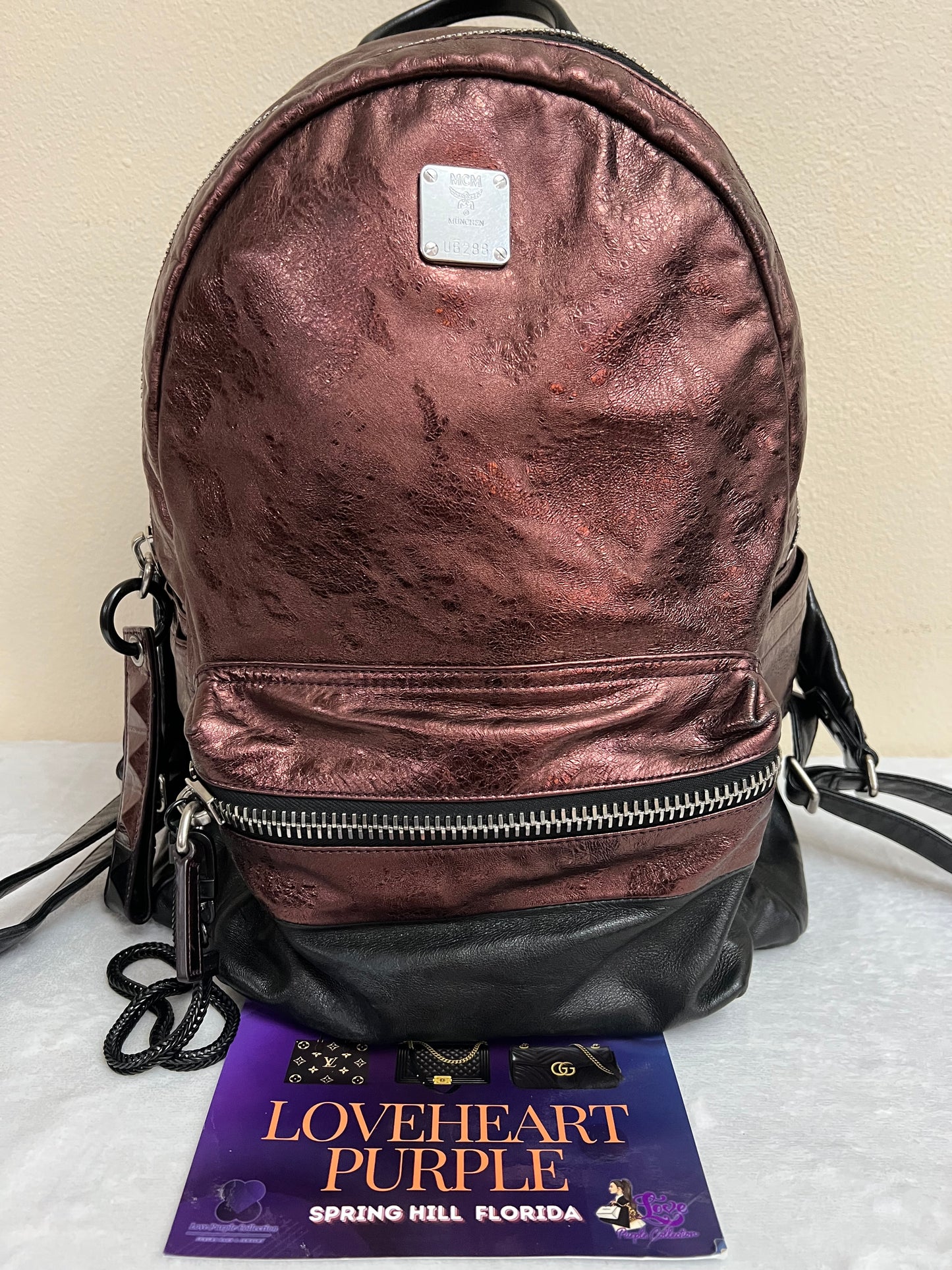 MCM BAGPACK MAROON METALLIC LEATHER