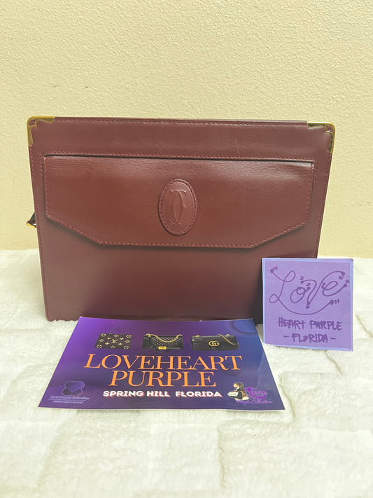 C_ A _ R _ T _ I _ E _ R CLUTCH MAROON