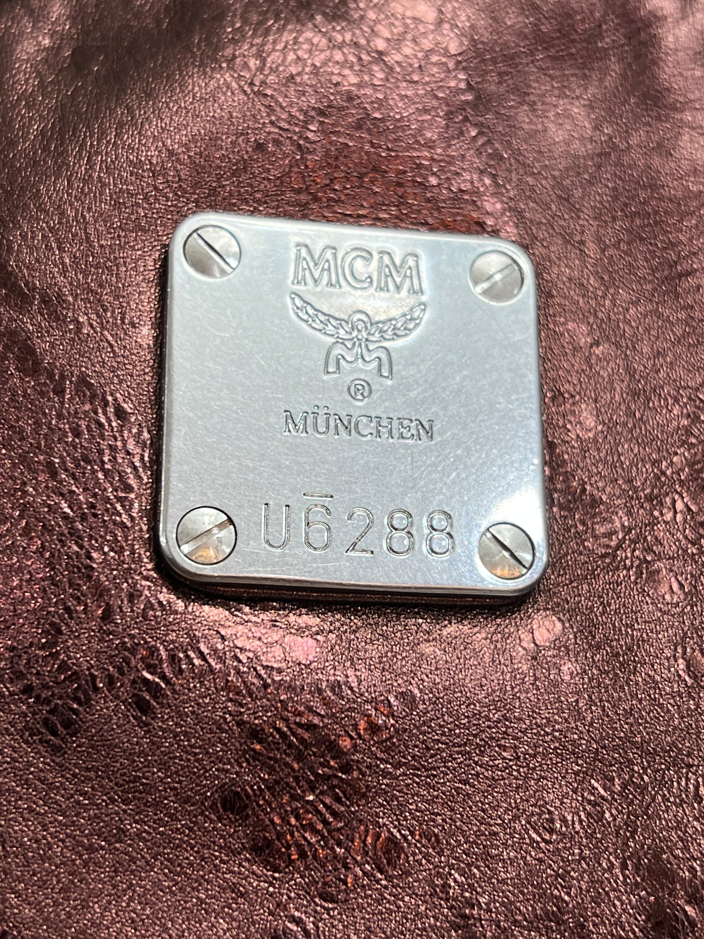 MCM BAGPACK MAROON METALLIC LEATHER