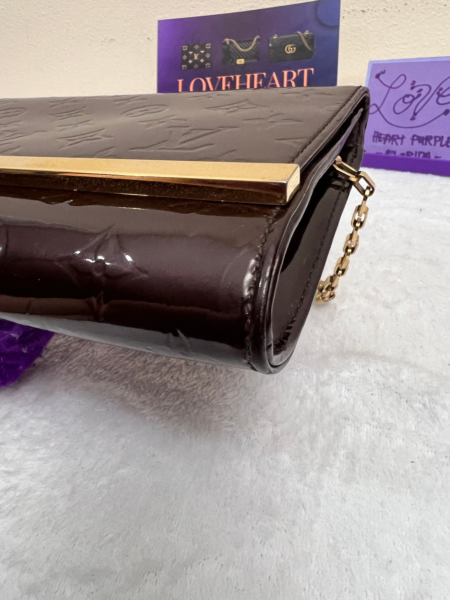 ANA CLUTCH VERNIS AMARANTE