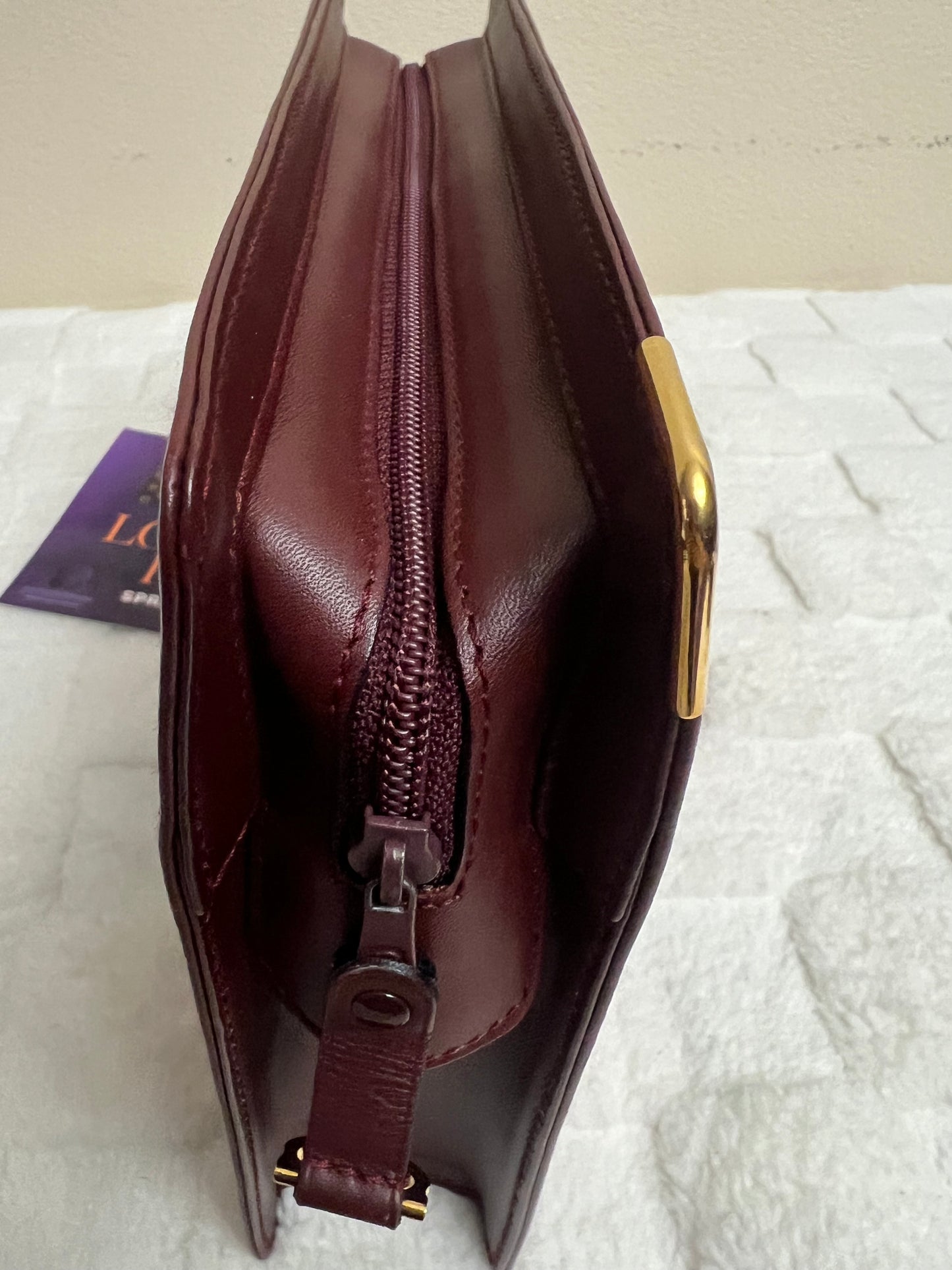 C_ A _ R _ T _ I _ E _ R CLUTCH MAROON