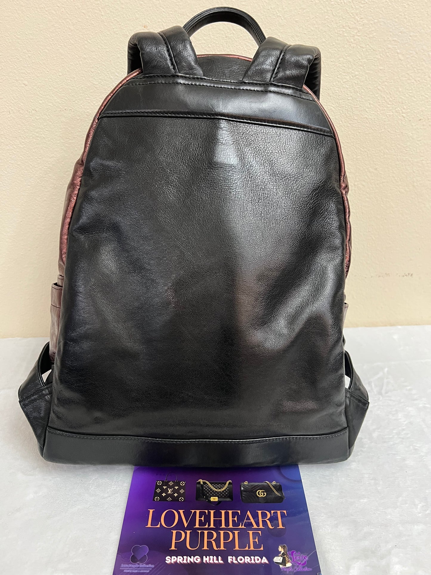 MCM BAGPACK MAROON METALLIC LEATHER
