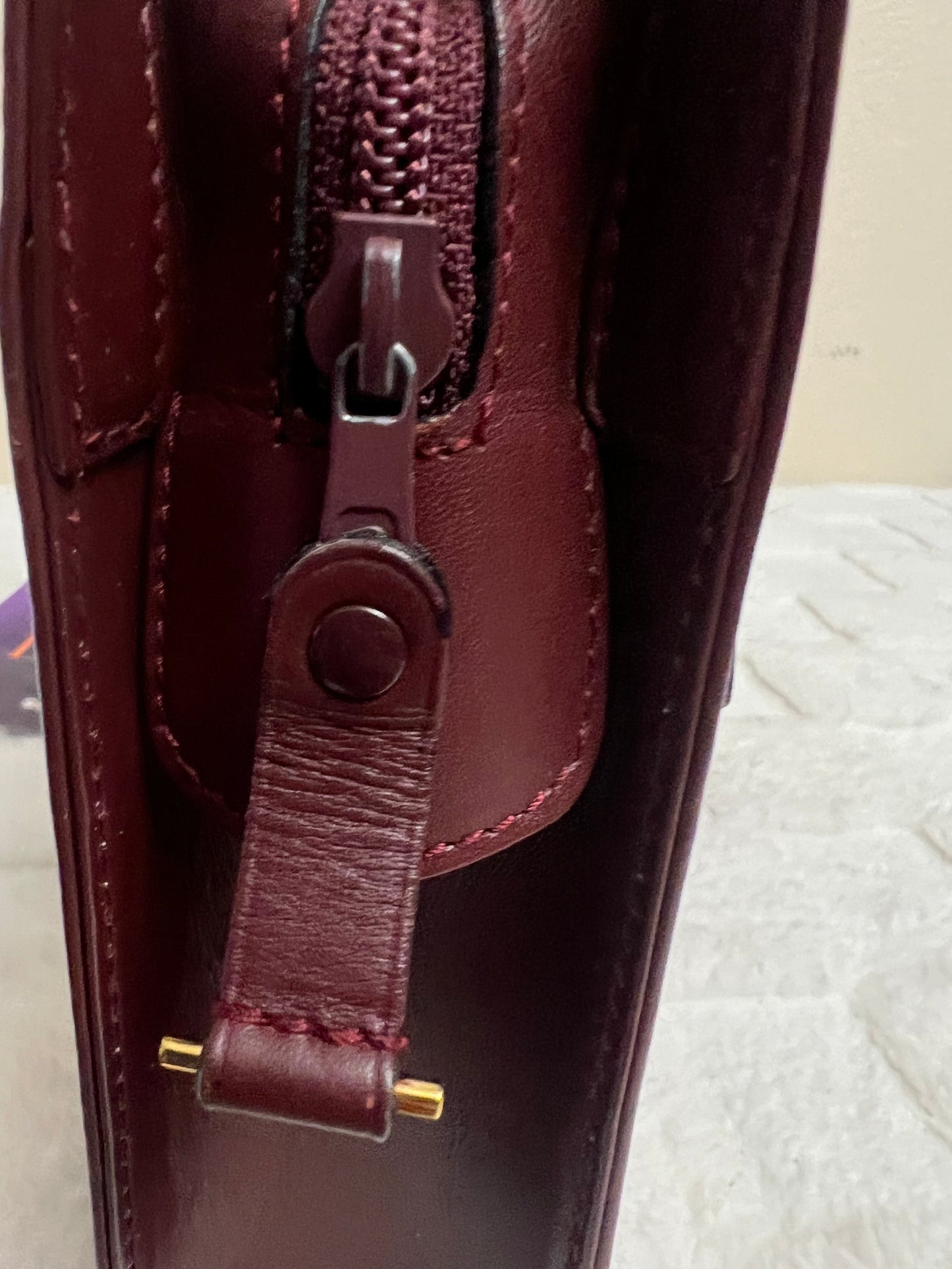 C_ A _ R _ T _ I _ E _ R CLUTCH MAROON