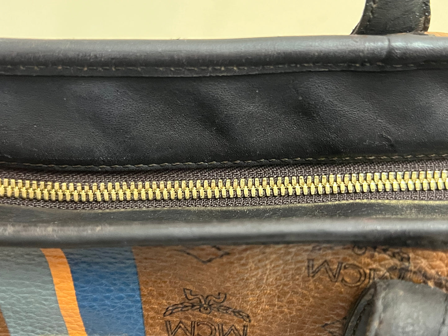 MCM CHOCO W/ BONE BLUE STRPES MM