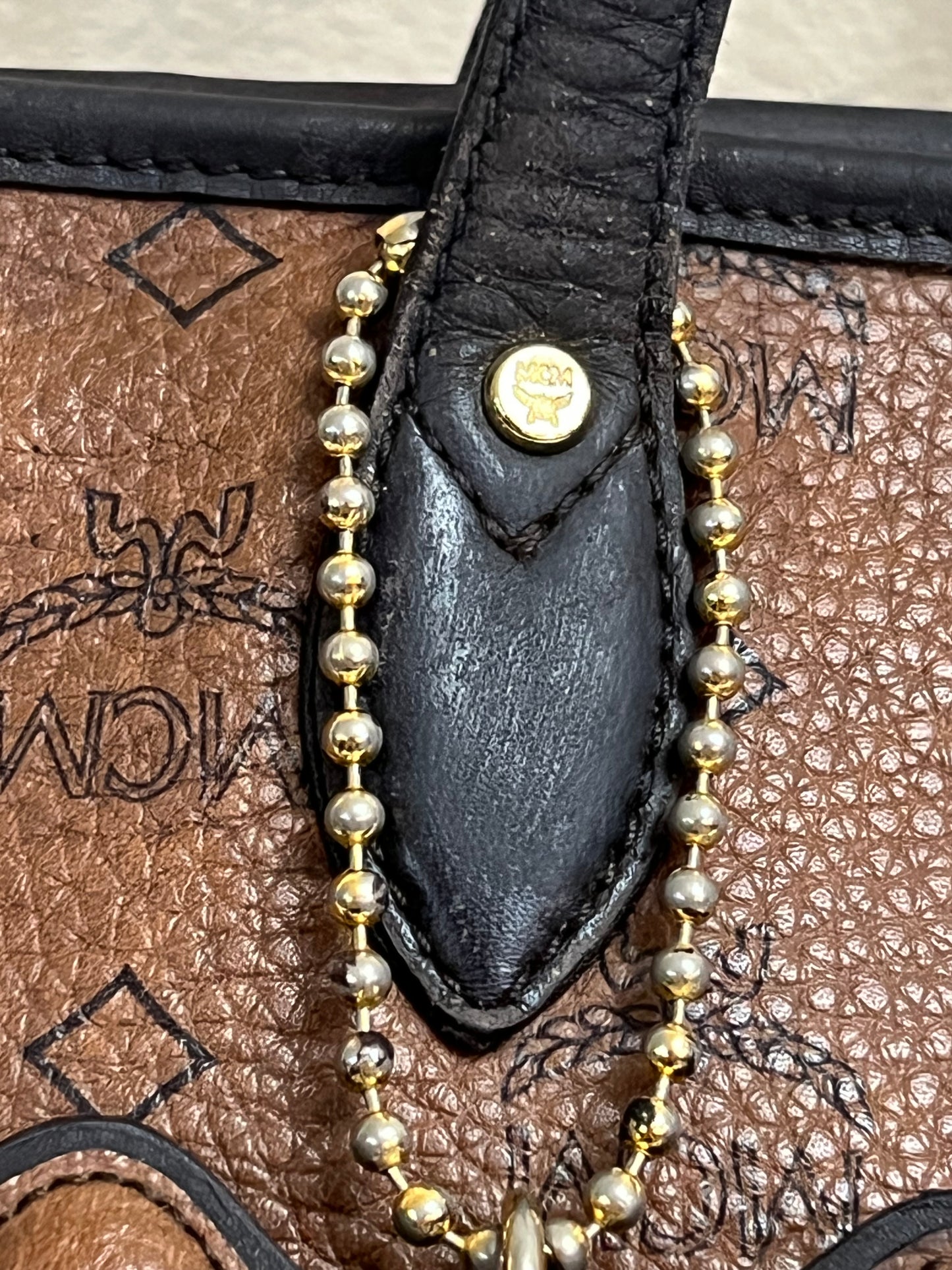 MCM CHOCO W/ BONE BLUE STRPES MM