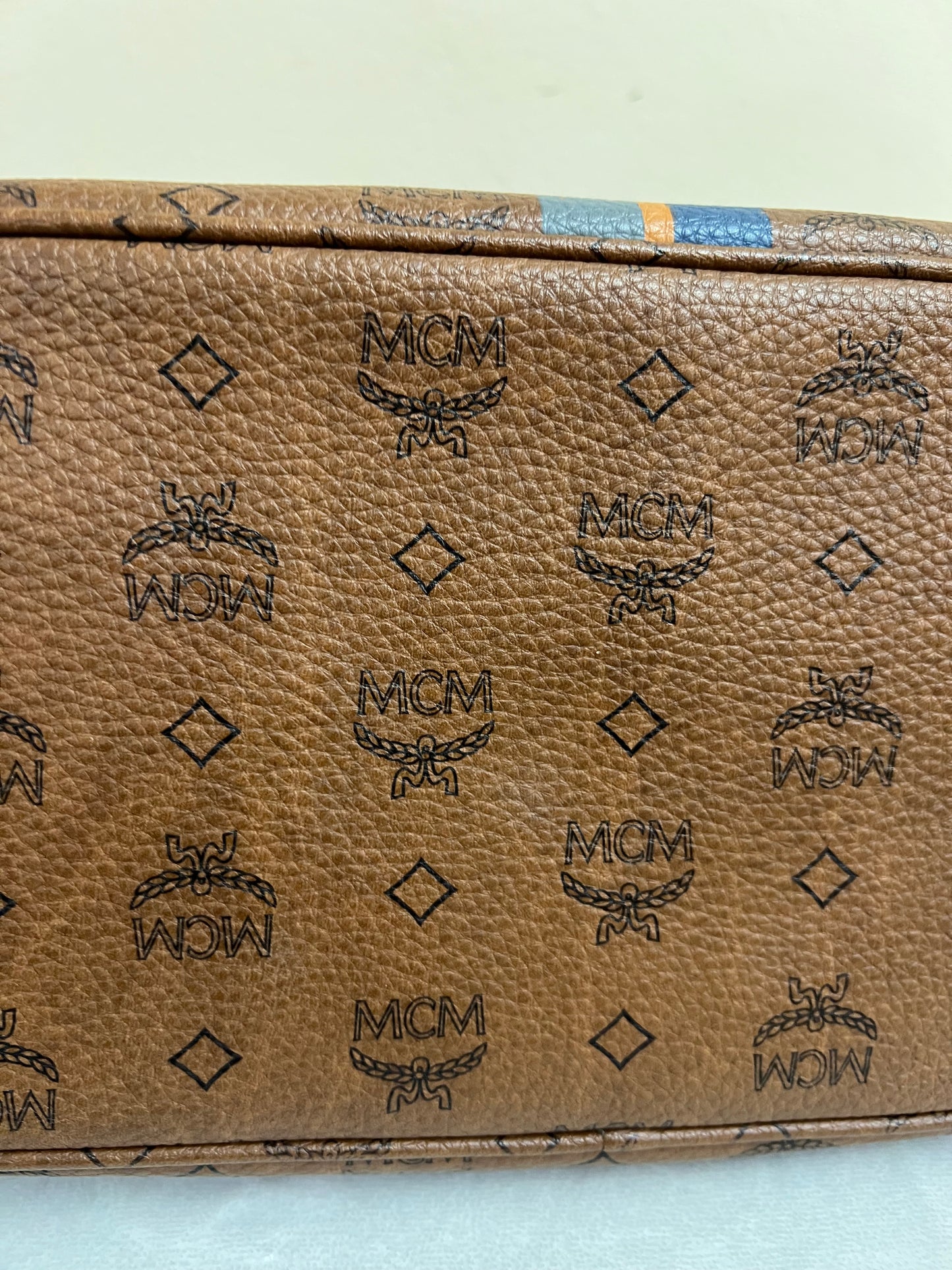 MCM CHOCO W/ BONE BLUE STRPES MM