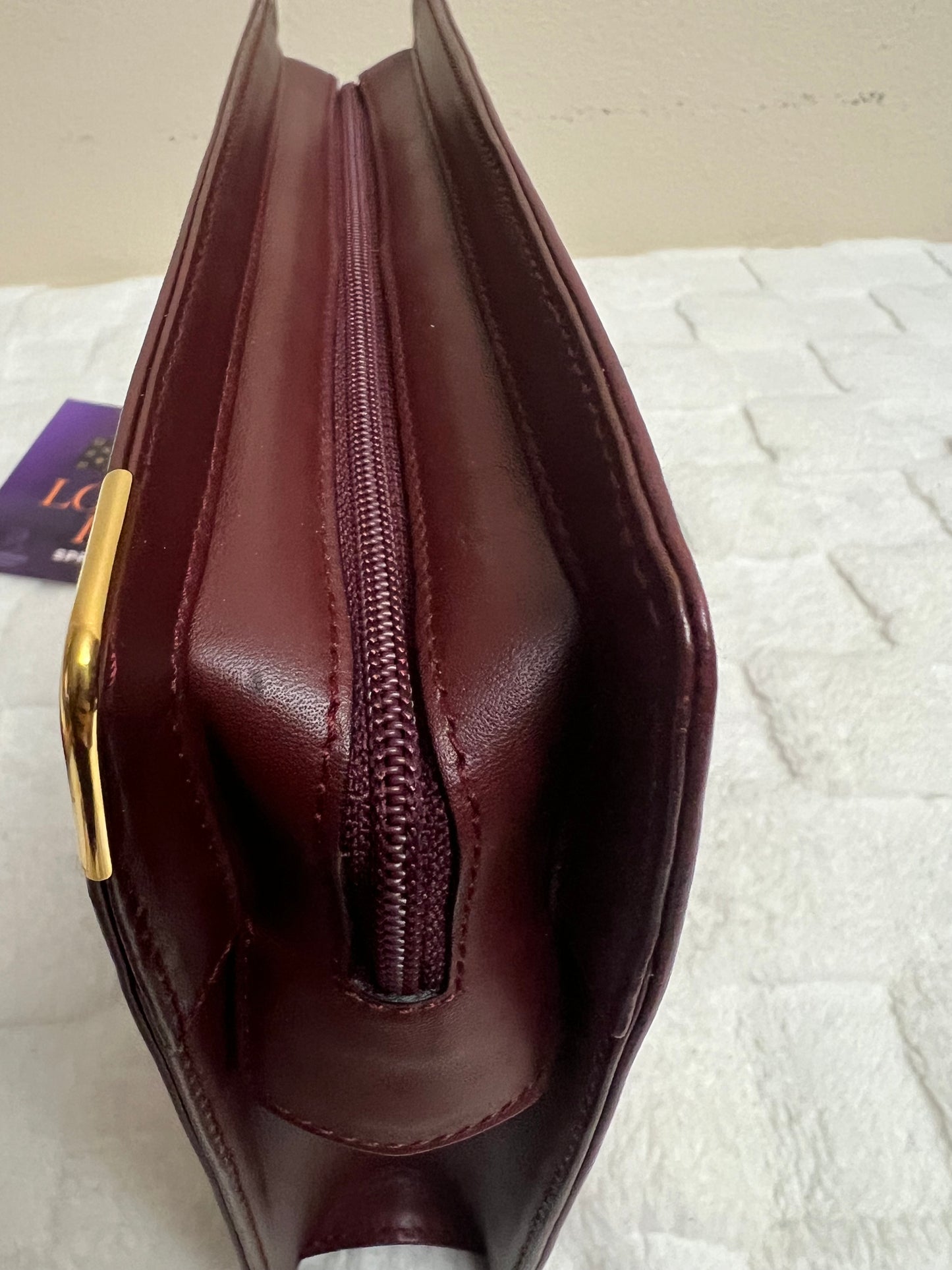 C_ A _ R _ T _ I _ E _ R CLUTCH MAROON