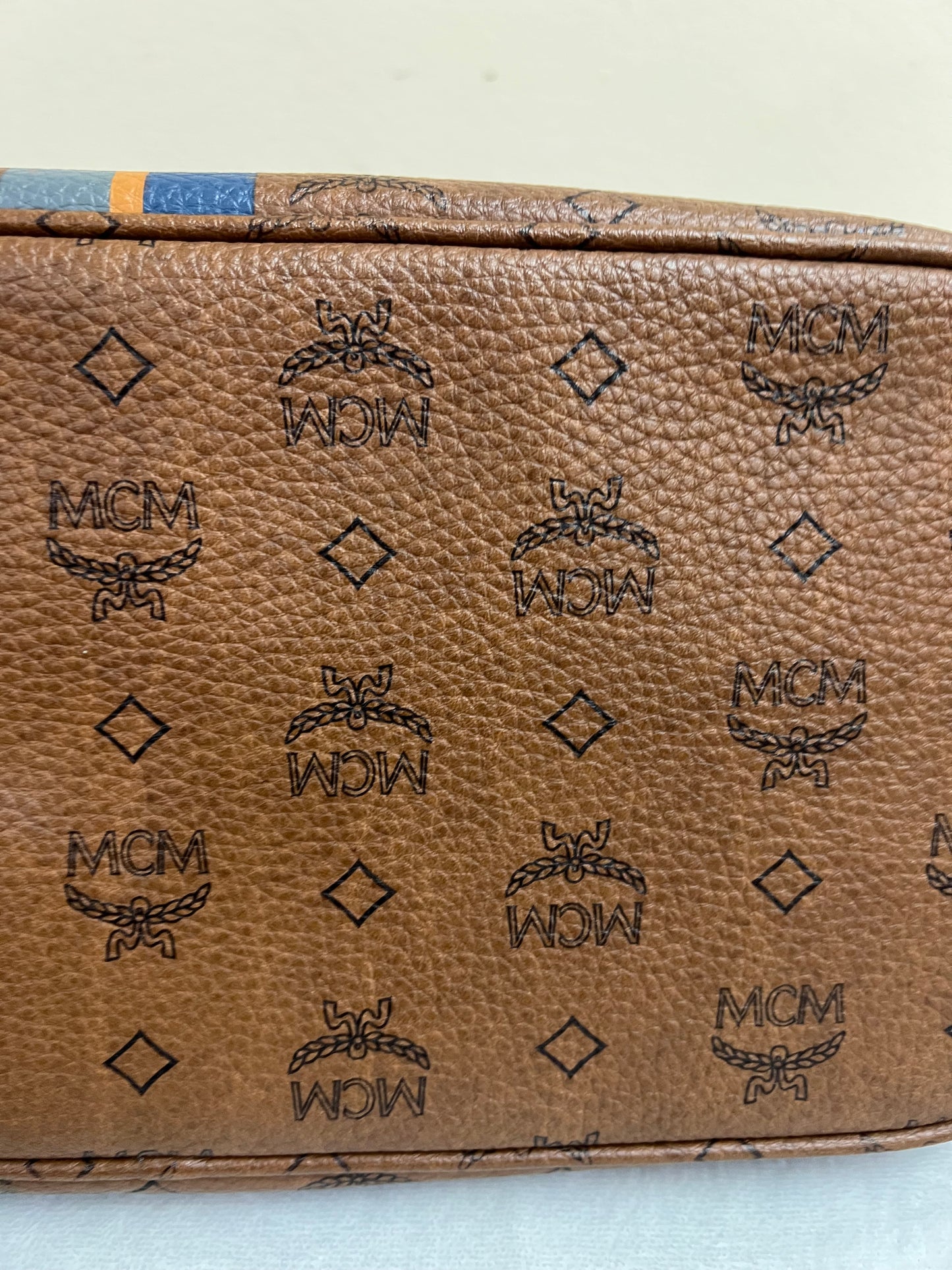 MCM CHOCO W/ BONE BLUE STRPES MM