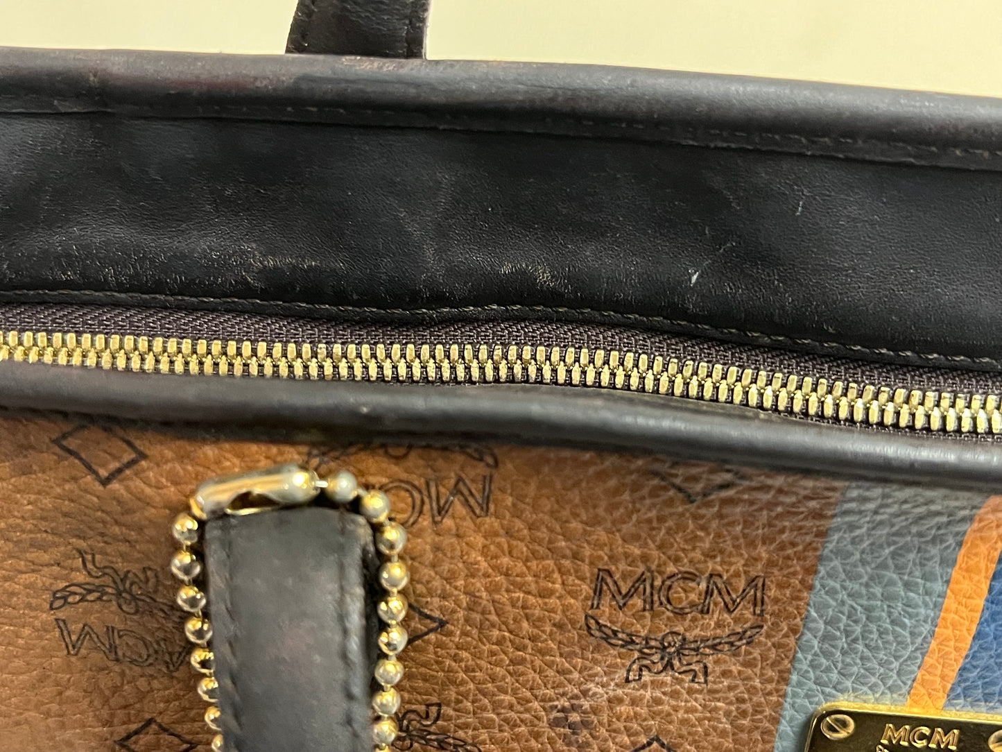 MCM CHOCO W/ BONE BLUE STRPES MM