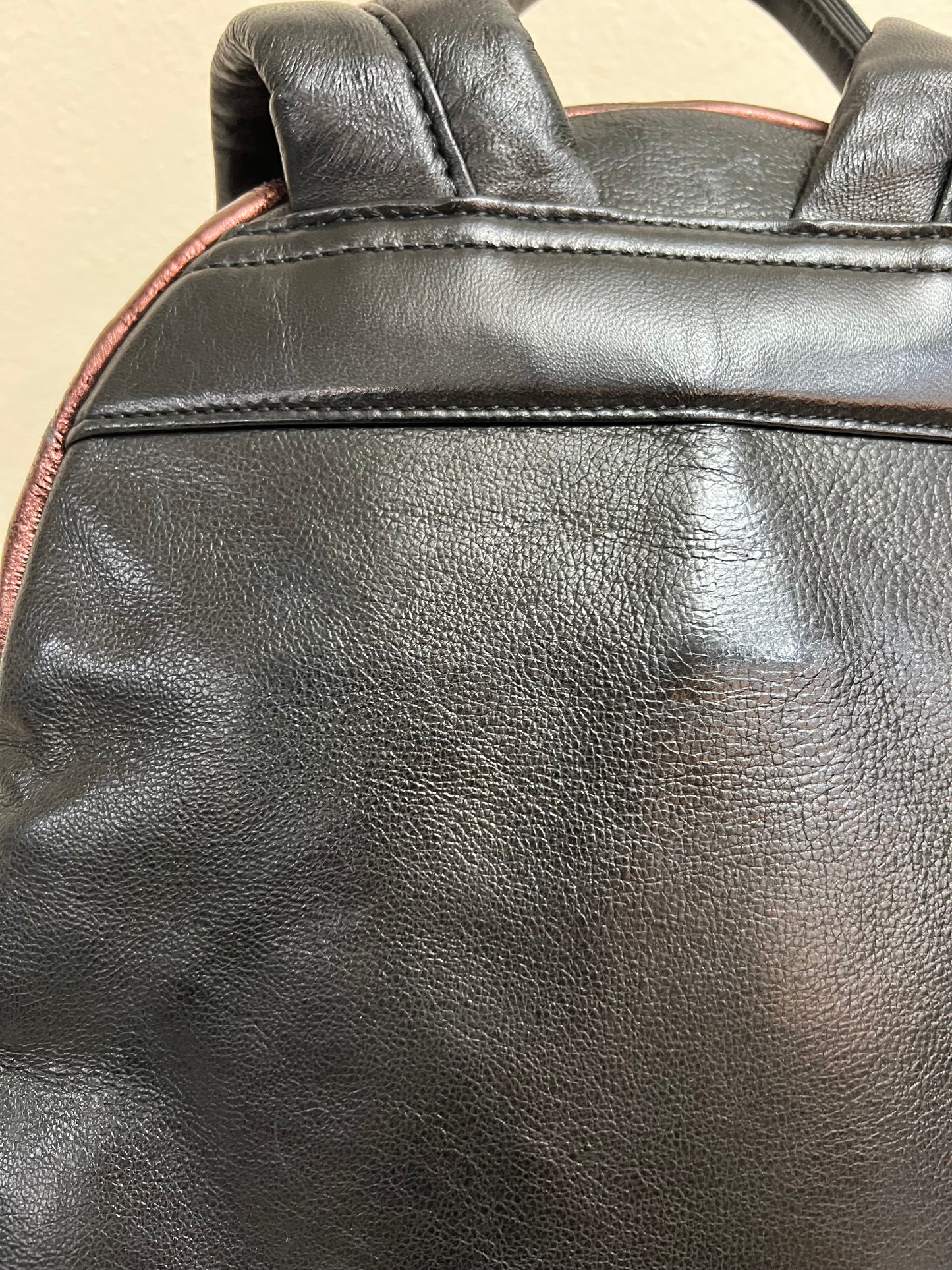 MCM BAGPACK MAROON METALLIC LEATHER