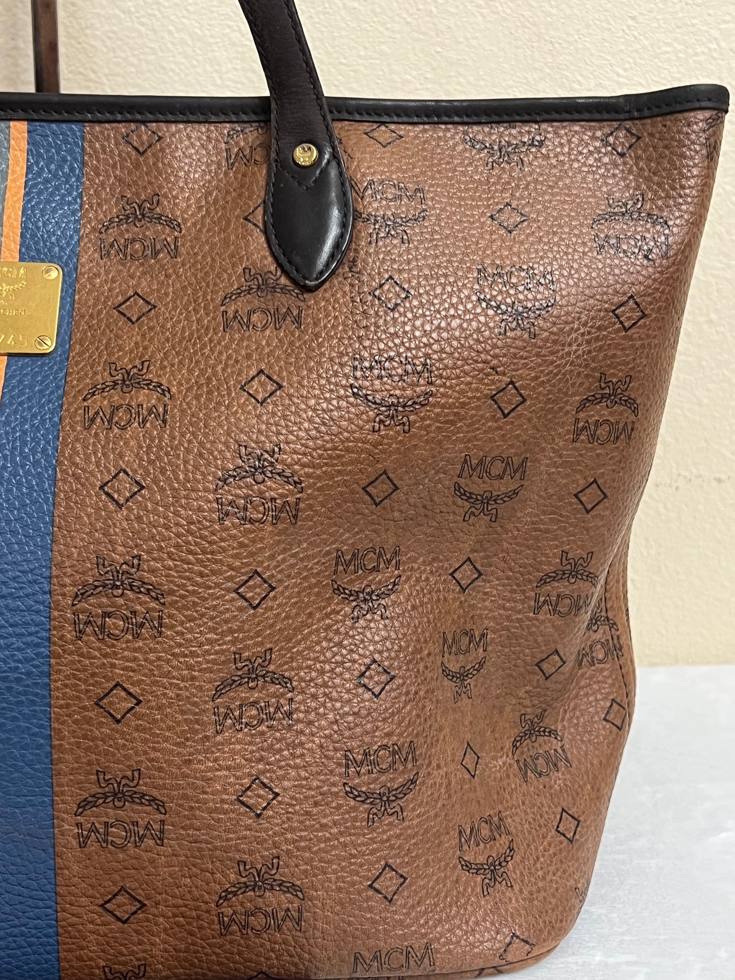 MCM CHOCO W/ BONE BLUE STRPES MM
